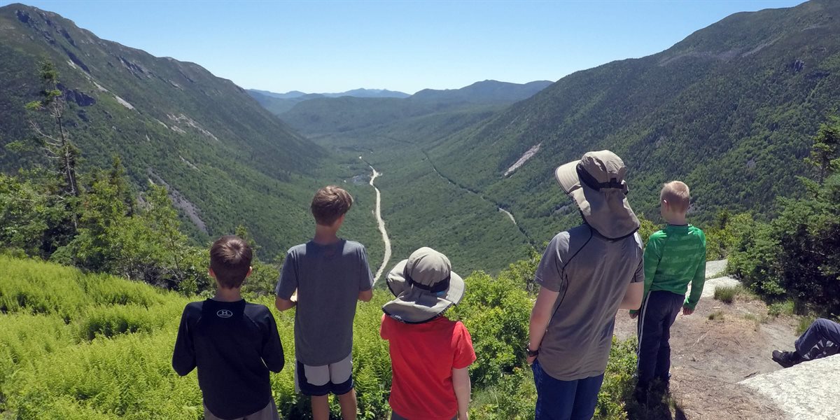 Boys hiking in the mountain