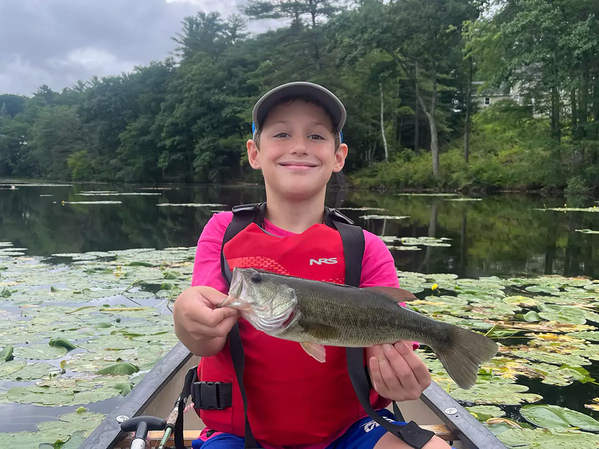 Boys fishing on Lake Winnipesaukee