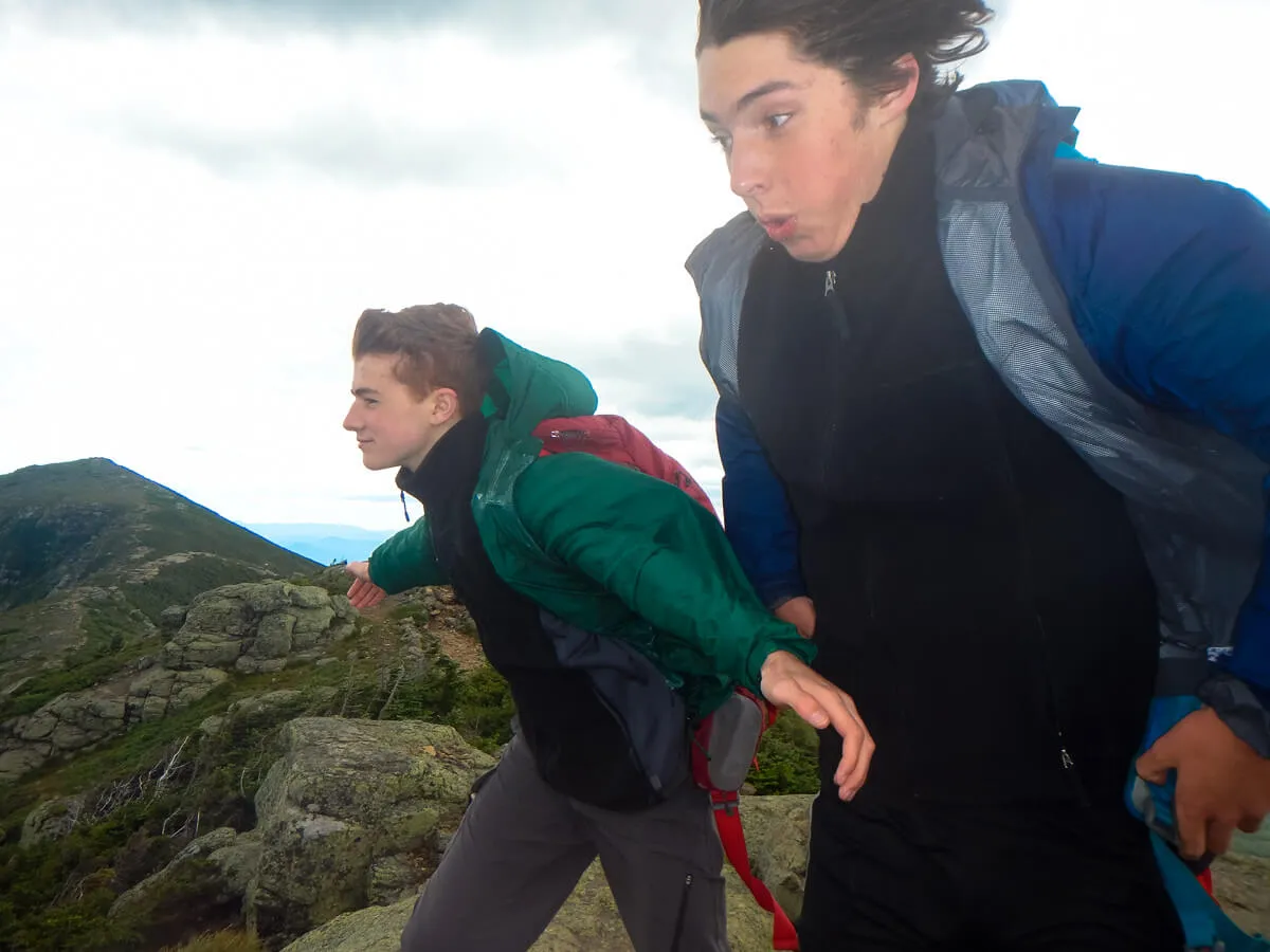 Boys at the pinnacle of their hike 